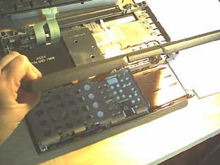Removing the trackpad and plam rest